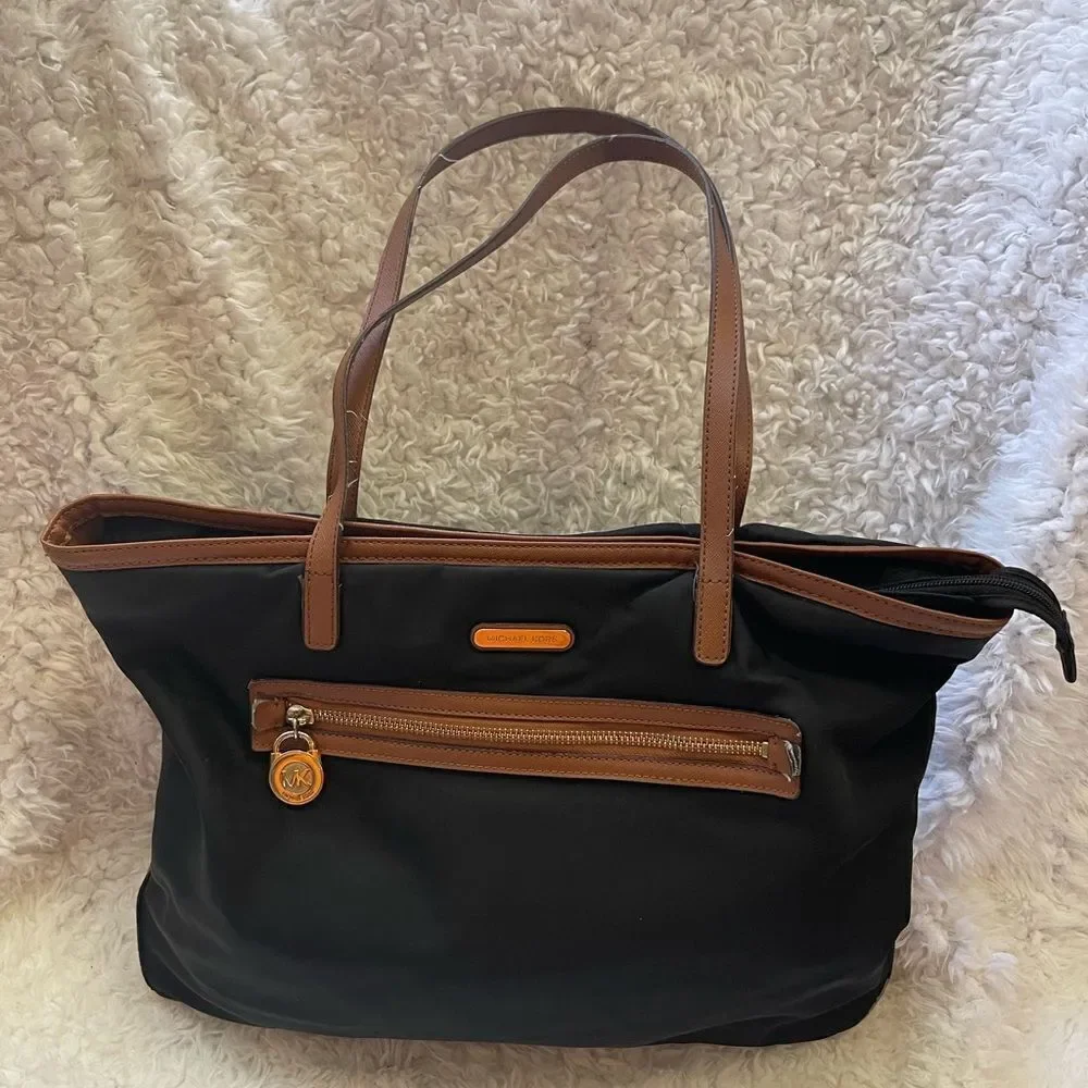 Michael Kors Kempton Nylon Black with Brown Leather traps Tote Bag .